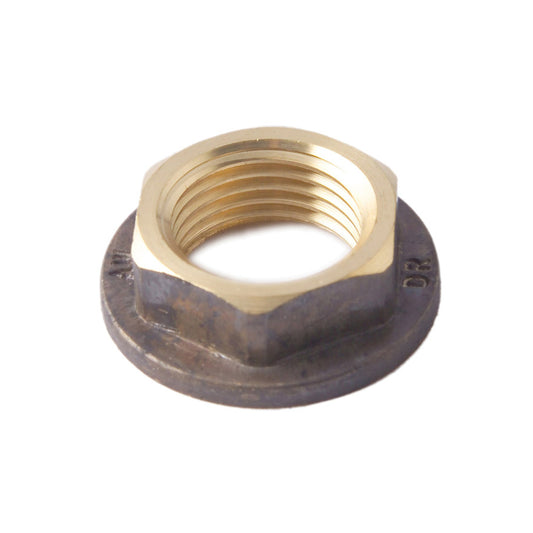Brass plumbing nut on a white background