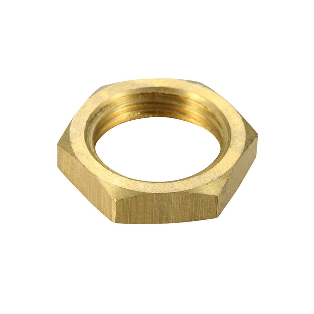 Brass hex nut on a white background