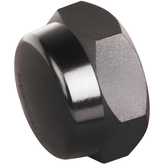 Black hexagonal nut on a white background