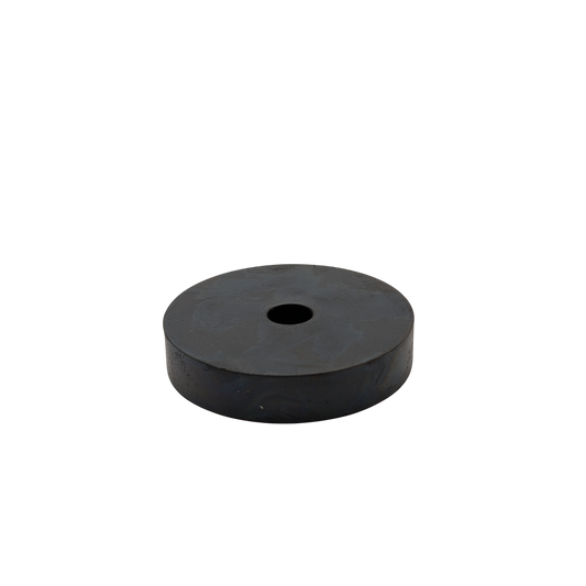 Black rubber washer on a white background